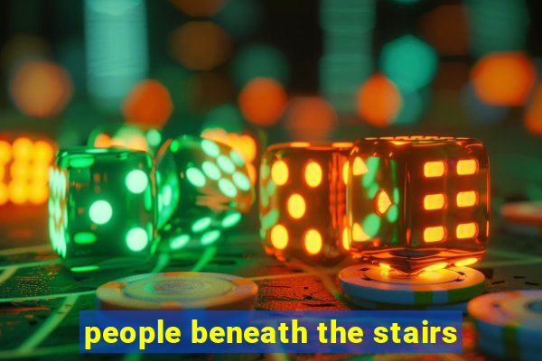 people beneath the stairs