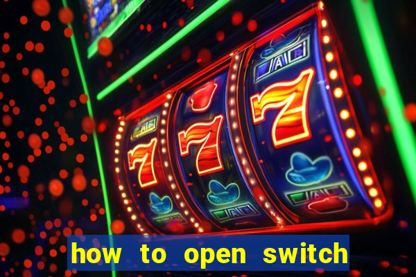 how to open switch oled game card slot